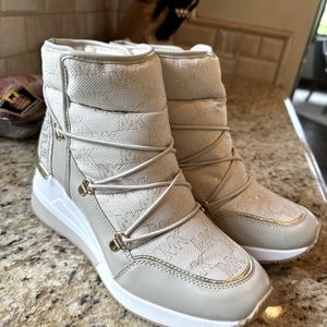 Brand new never been worn Michael Kors lifted sneakers